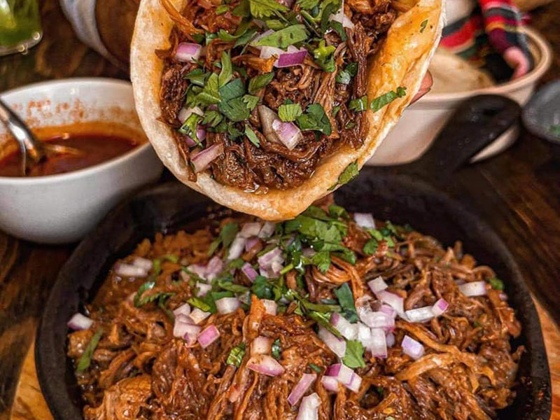 Birria tacos at Sabor Latino Bra